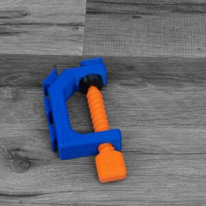 This is a Hot Wheels Compatible Track Clamp with Multiple Launch Angles for the Hot Wheels Track