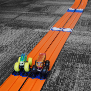 This is a photo of a Monster Jam Track Add on that is compatible with Standard Hot Wheels Track.