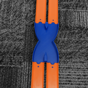 Hot Wheels Track Crossover Lane Switch with high walls, made in the USA with eco-friendly plastic for thrilling racing and crashing fun