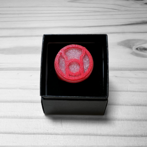 Red Power Glow in the Dark Ring with a glowing insignia, available in three sizes, perfect for costume play and imaginative adventures