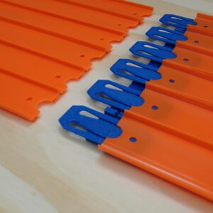 Hot Wheels Track Spacer for perfect alignment, available in 2, 4, or 6 lanes, made in the USA with eco-friendly plastic for smooth racing