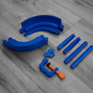 Monster Truck Track Turn Set with left and right turns, turn guides, stabilizers, clamp, and attachment—eco friendly toy, made in the USA, fits 1/64 scale trucks